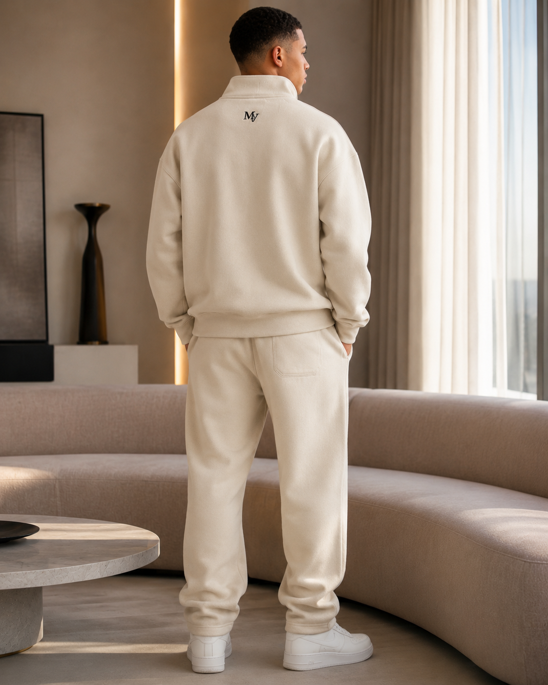 Signature Quarter-Zip in Crème — worn back