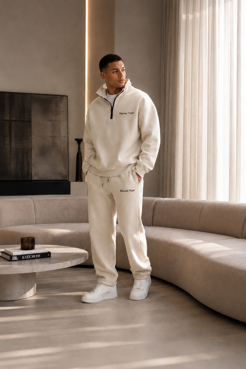Signature Quarter-Zip in Crème — worn front