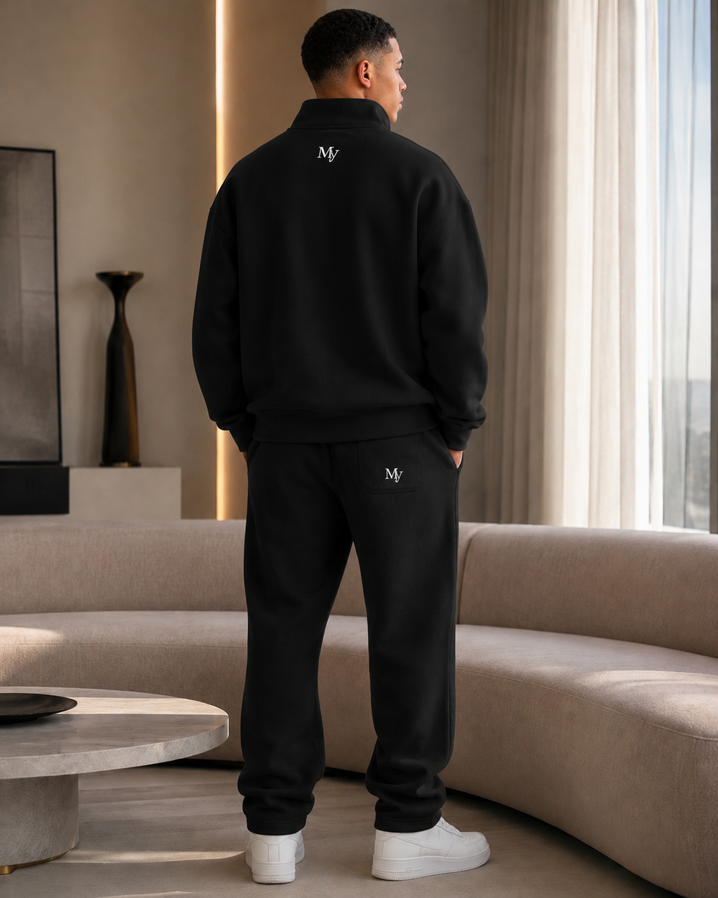 Signature Quarter-Zip in Noir — worn back
